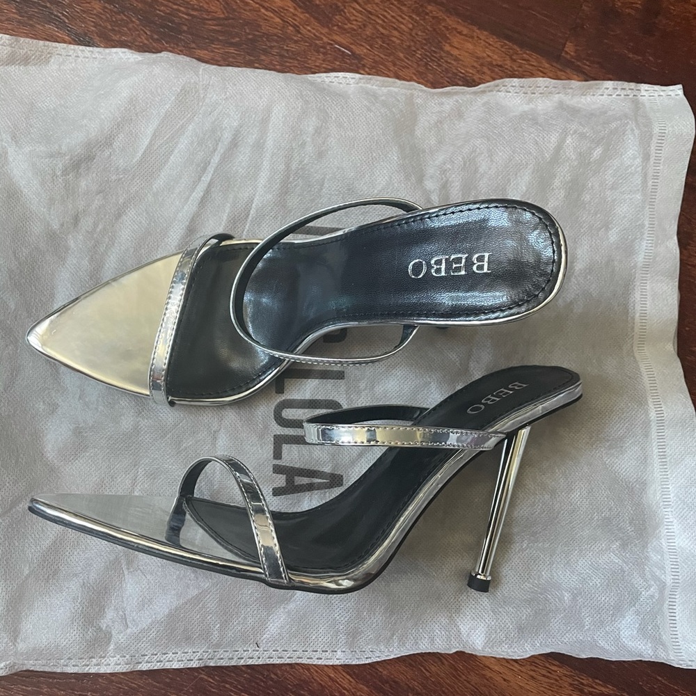 New never worn silver heels